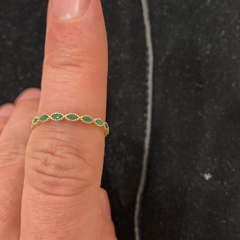 Gold plated ring with green stones